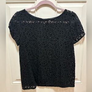 Lace short sleeve blouse.